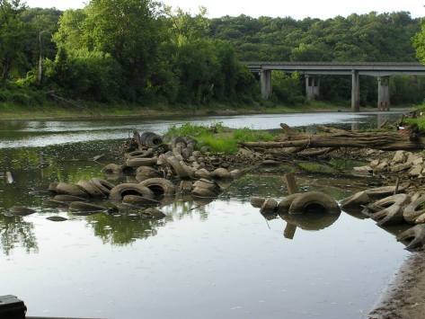 There used to be a large pile of tires on the Meramec river across from Emmenegger Nature Park. These tires were remove in 2005 with the help of Open Space Council for the St. Louis Region, Metropolitan St. Louis Sewer District, and a few local stream teams. 